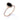 Angle view of delicate halo ring featuring an elongated oval black diamond set on a slim band lined with tiny white stones.