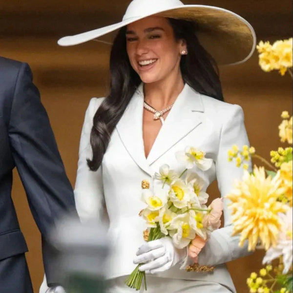 Dua Lipa’s Wedding Look How Her Schiaparelli Skirt Suit Redefined Modern Bridal Fashion