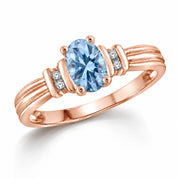 Angled View Of 0.69 Carat Oval Cut Blue Diamond Ring