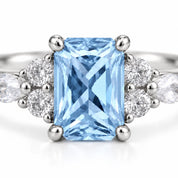 closeup view of 1.34 Carat Radiant Cut Diamond Ring with Marquise and Round Diamonds