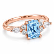 Angled View Of 1.34 Carat Radiant Cut Diamond Ring with Marquise and Round Diamonds