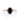 Front view of delicate halo ring featuring an elongated oval black diamond set on a slim band lined with tiny white stones.