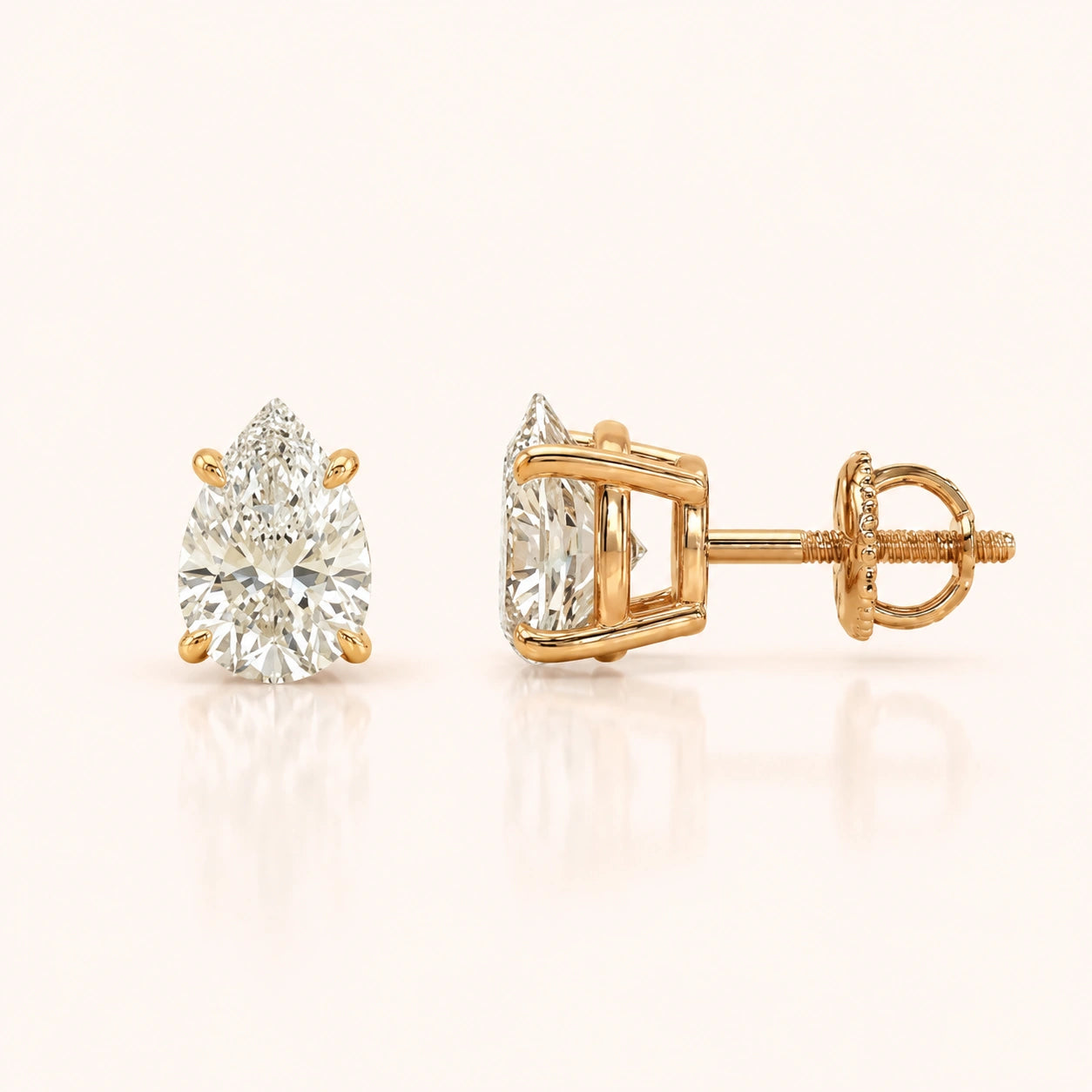 Luxury Pear Diamond Stud Earrings by Size & Setting