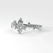 Side View Of 0.56 carat Pear Cut Tiara Style Diamond Promise Ring 
