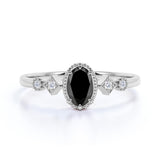 2 Ct Oval Face Shape And Round 5 Stone Black And  White Diamond Ring